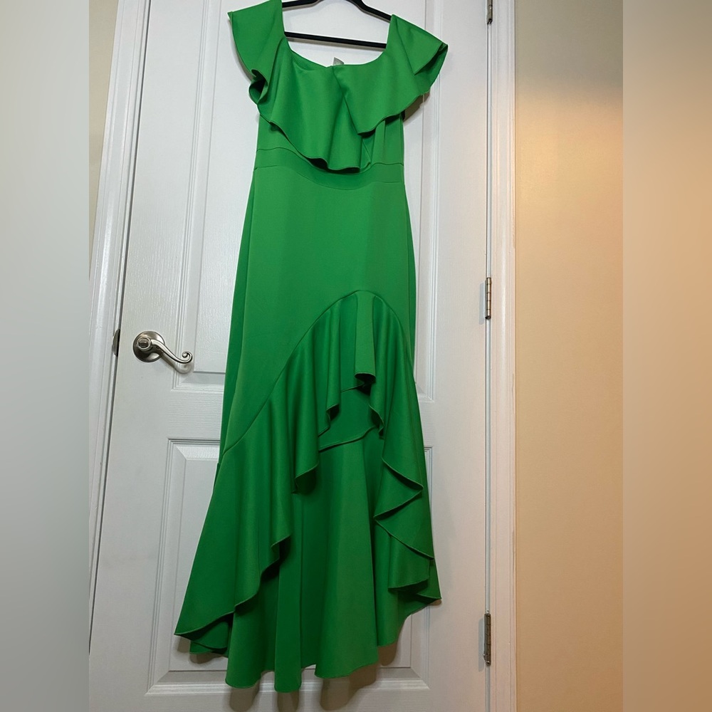 Green hi low off shoulder dress. Flare bottom, high waist and detail top.